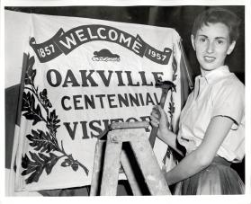 Putting up centennial decorations