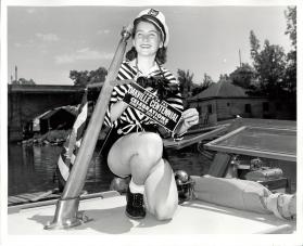 Girl on a boat promoting Centennial