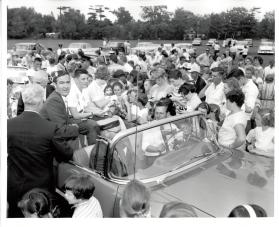 Turning of Sod for the Lion's Club Swimming Pool, Marilyn Bell giving autographs