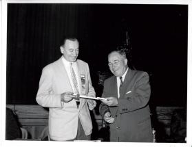 Presentation: Mayor William Anderson presenting Key of the Town to Mayor Pratt of Dorval Quebec