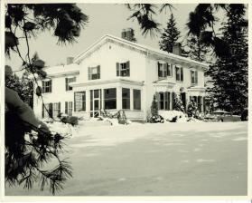 House on Northwest corner of Lakeshore Road East and Balsam Drive