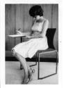 Woman sitting on Chair