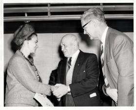 Reeve Herb Merry (R) introducing Mrs. Desnoyers (Mayor of Droval's Wife) to Hon. Earl Rowe