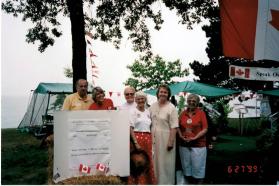 Speak Out!... Canada... Pensons-y! Members at Coronation Park during the Oakville Waterfront Festival in 1998 with Mayor Anne Mulvale