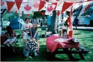 Speak Out!... Canada... Pensons-y! Member and child at Coronation Park during the Oakville Waterfront Festival
