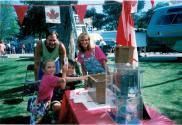 Family posing with Time Capsule Box at Coronation Park during the Oakville Waterfront Festival 1998