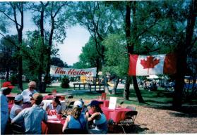 People at Coronation park during the Oakville Waterfront Festival filling out Speak Out!... Canada... Pensons-y! Ballot entries